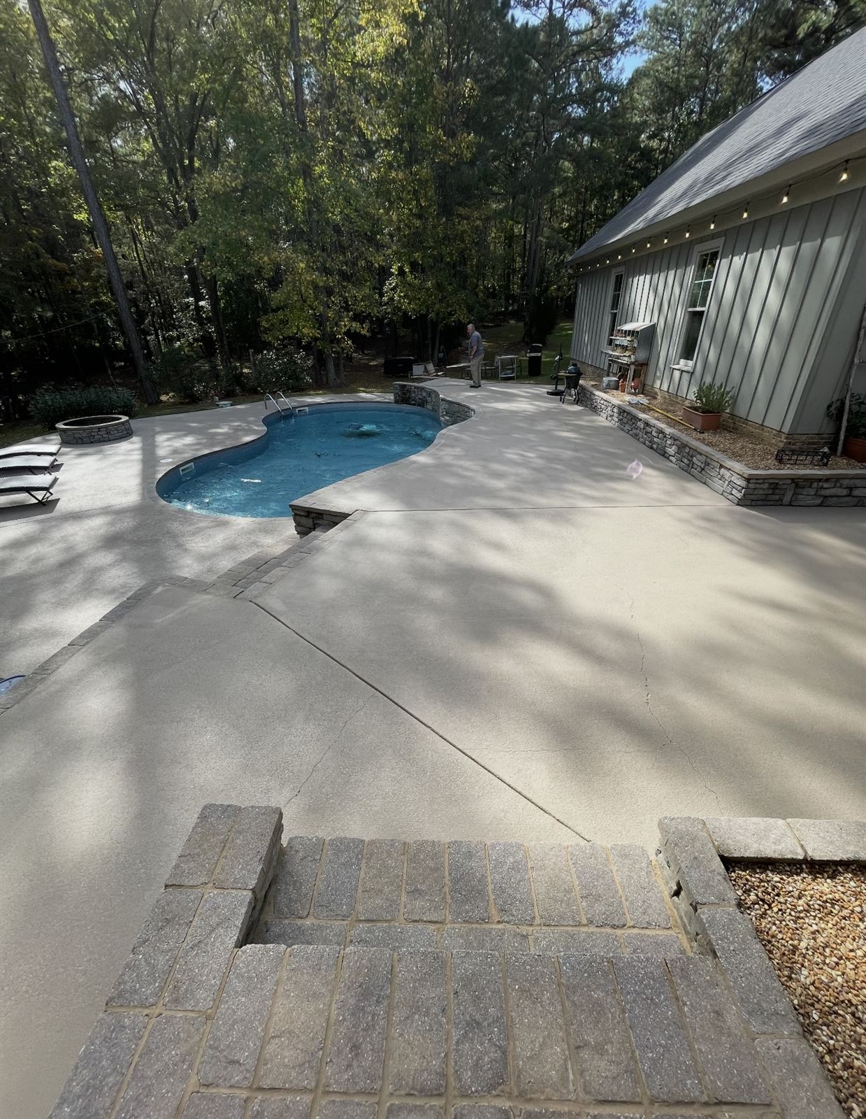 Bright, even pool deck concrete after pressure washing in Columbus, GA